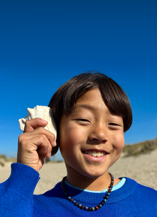 Fotka pořízená 48Mpx Fusion fotoaparátem, použití portrétů další generace, zaostření na obličej člověka